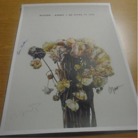 Win a signed SLEATER-KINNEY poster from Zia Records
